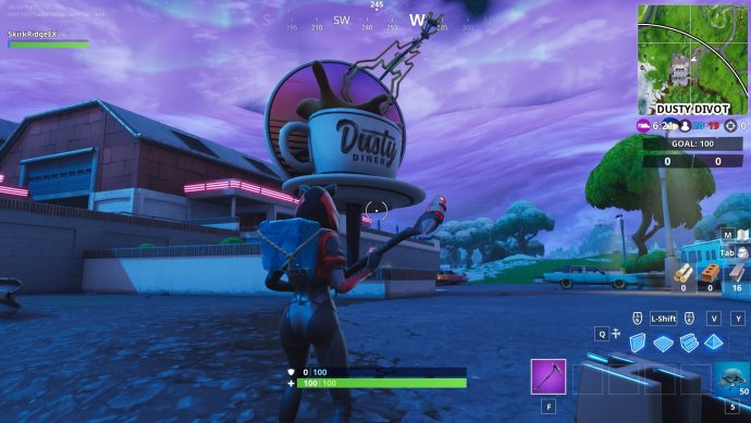 An oversized coffee cup near Dusty Divot.