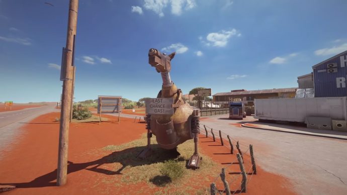 A metal kangaroo with a sign saying "Last Chance Gas!" that stands outside of Hanley's Roadhouse.