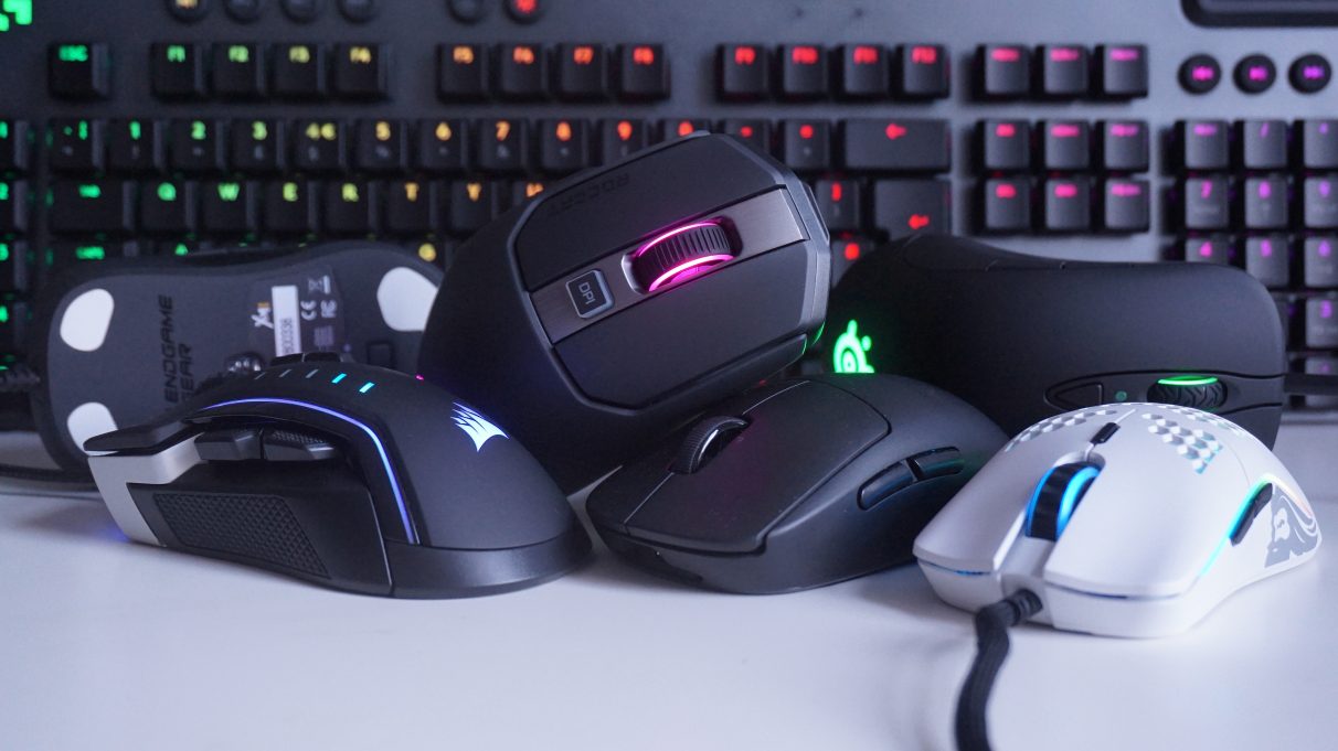 A photo showing a collection of gaming mice all piled on top of one another.