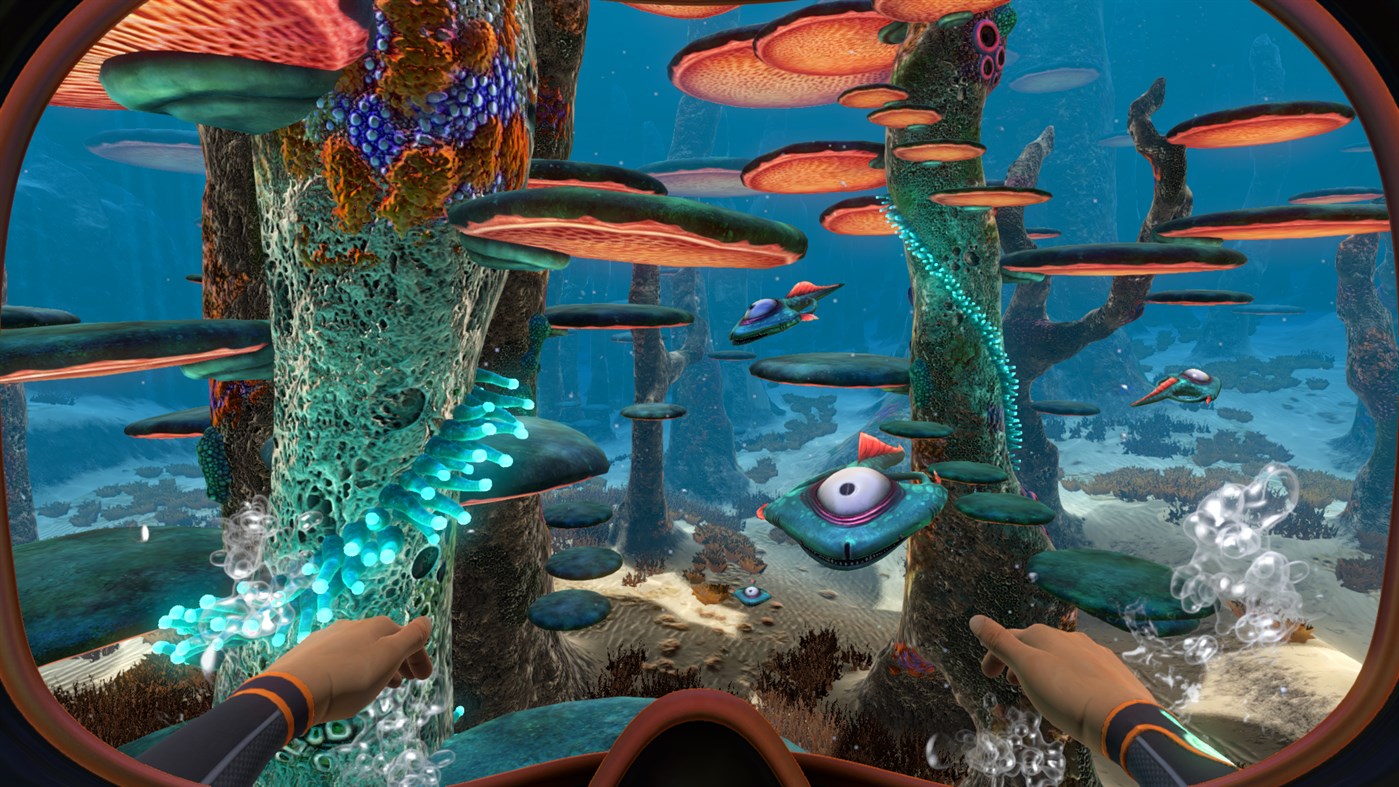 A screenshot showing the alien, underwater flora and fauna of Subnautica.