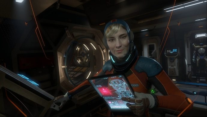 A screenshot of Captain Olivia Rhodes from Lone Echo holding a tablet with your android character's face on it.