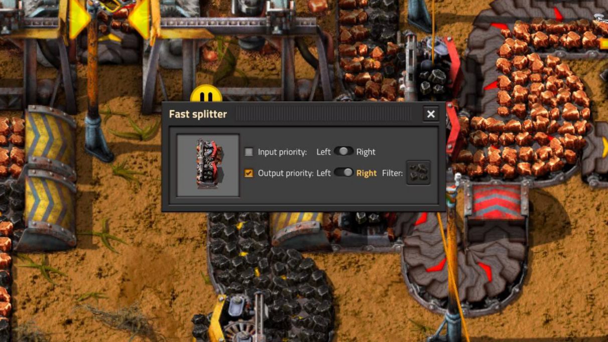 Clicking on a splitter in Factorio allows you to set input and output priorities, and to filter certain items.