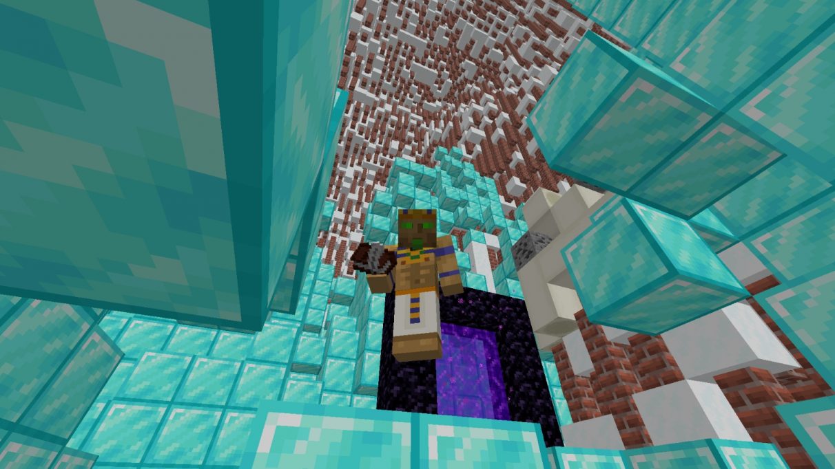 A blocky pharaoh stands in a weird cavern made of diamond blocks, bricks and snow.