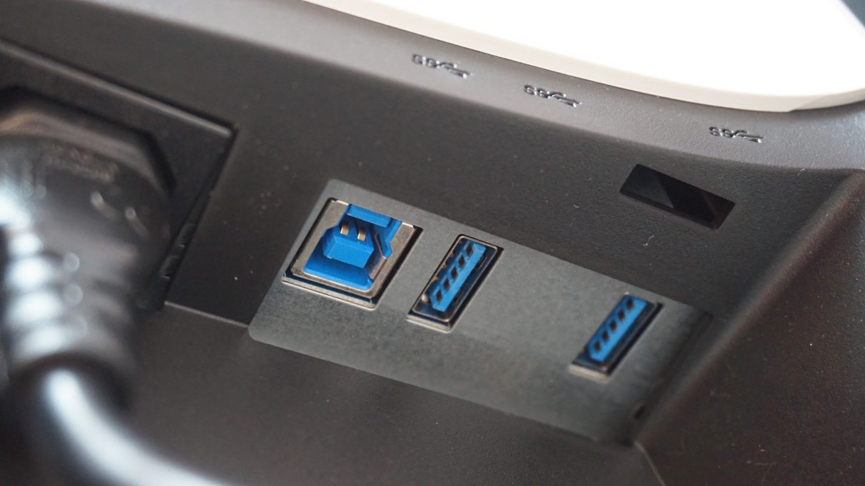 A photo showing the other two USB 3.0 ports on the Alienware AW2521HFl, which are located on the back of the monitor next to the power plug.