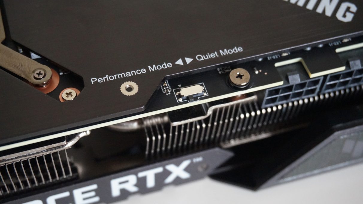 A photo of the Asus TUF Gaming GeForce RTX 3080's Performance / Quiet mode switch.