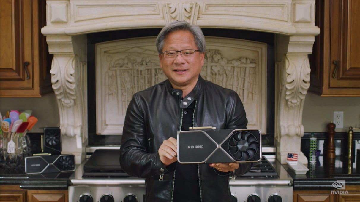 Nvidia's CEO Jensen Huang holding the enormous RTX 3090