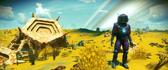 A screenshot of the player beside a strange artifact in No Man's Sky.