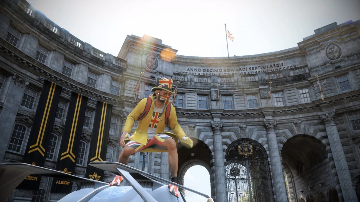 Captain London, crouched ready to fight on top of a battered sports car, with a big arch behind him