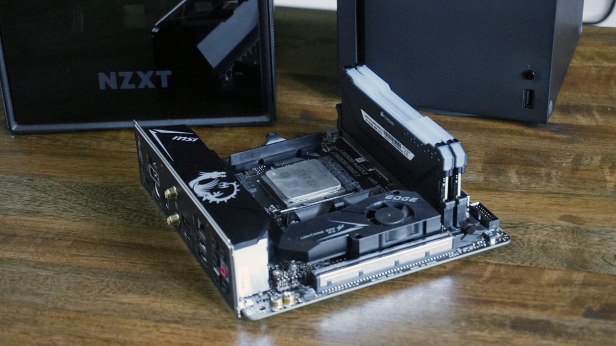 A mini-ITX motherboard with a CPU and RAM connected.