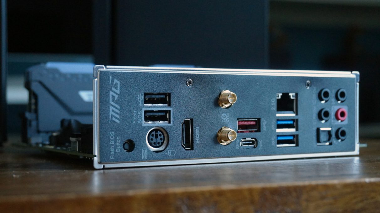 A photo showing the USB ports, Wi-Fi antenna and display outputs of a mini-ITX motherboard.